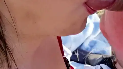Ladyboy in the park sucking two cocks like a pro